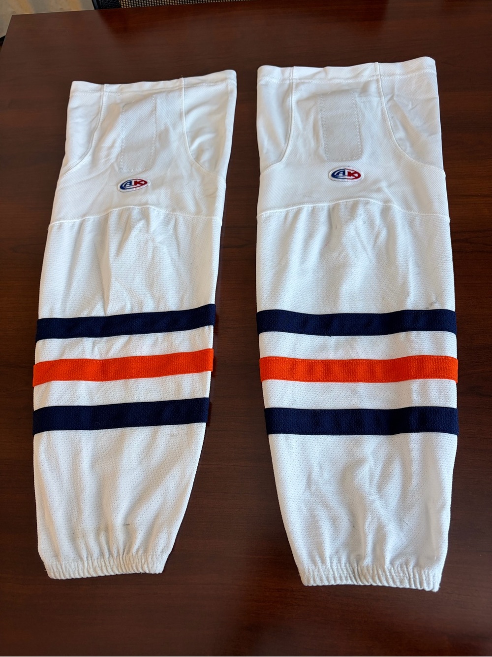Youth White Hockey Socks with Navy and Orange Stripes size M intermediate